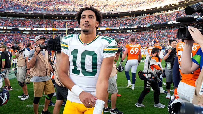 Green Bay Packers quarterback Jordan Love (10) walks off the field after an NFL football game...
