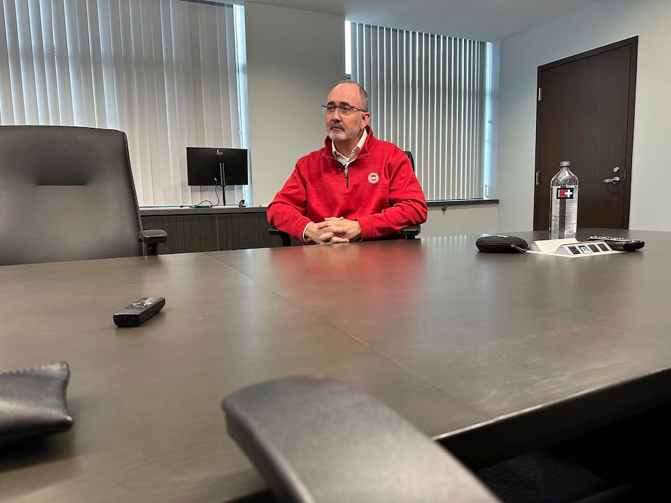 United Auto Workers President Shawn Fain speaks to a reporter from The Associated Press during...