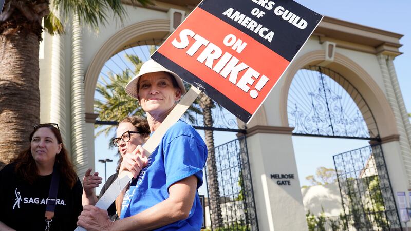 FILE - Meredith Stiehm, president of the Writers Guild of America West, pickets outside...