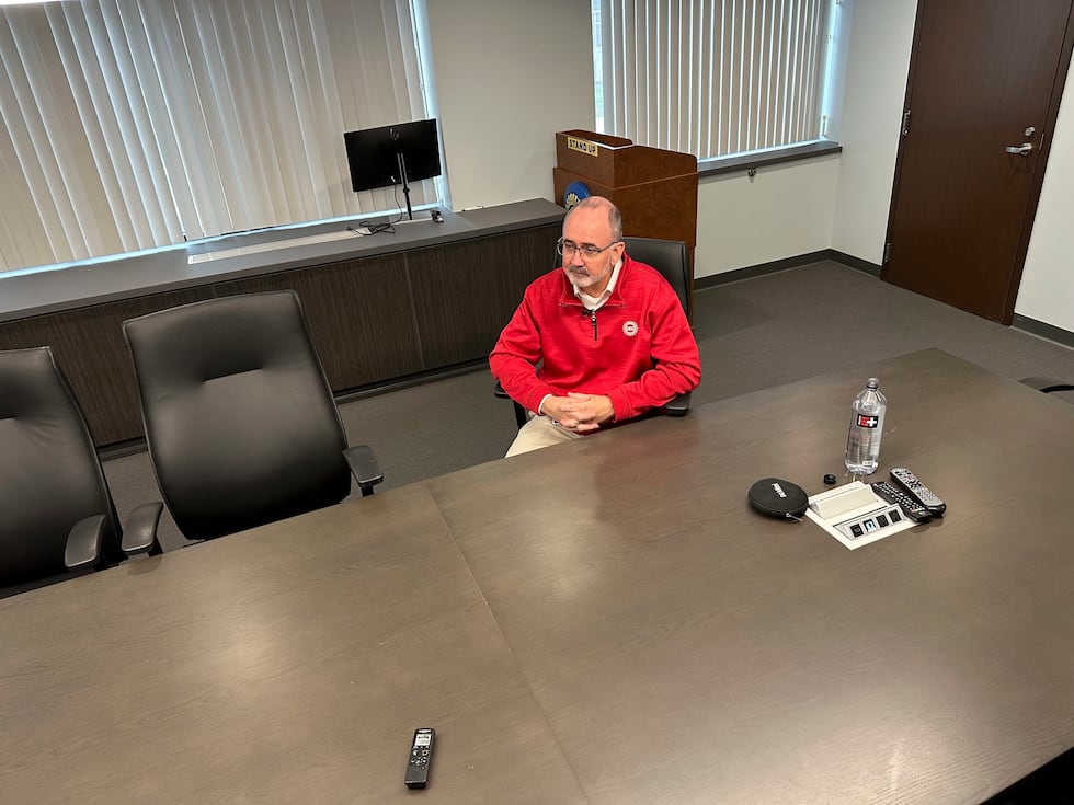 United Auto Workers President Shawn Fain speaks to a reporter from The Associated Press during...