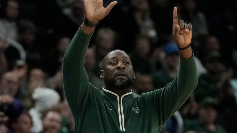 Milwaukee Bucks head coach Adrian Griffin reacts during the second half of an NBA basketball...