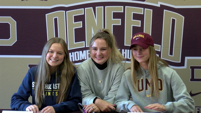 From left to right: Camryn Seguin, Denfeld head coach Leah Hamm, and Alyssa Doyle.
