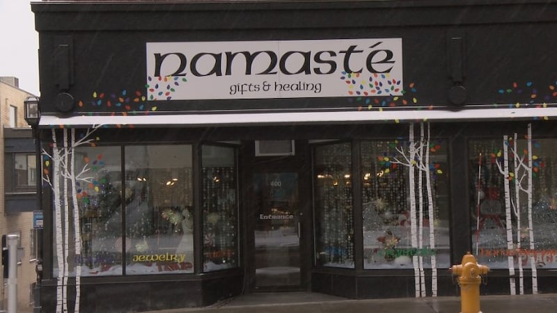 Local businesses decorate windows ahead of holiday festivities