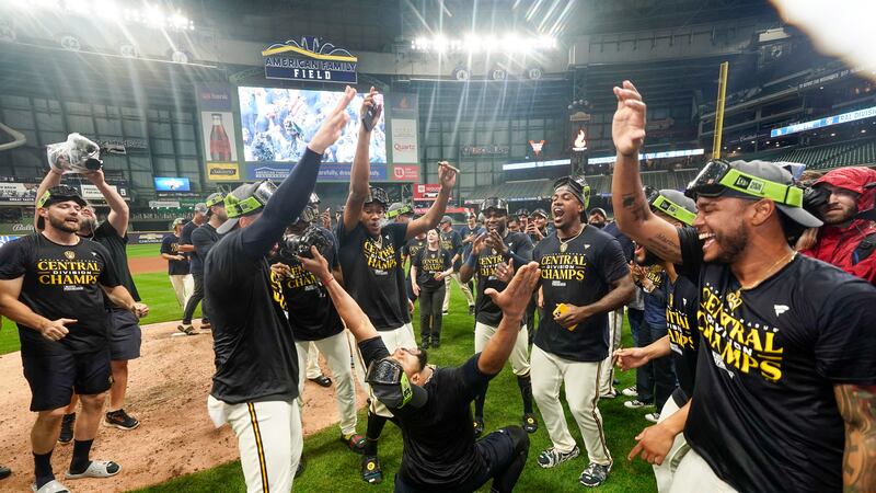 Milwaukee Brewers' players celebrate after clinching the National League Central Division...