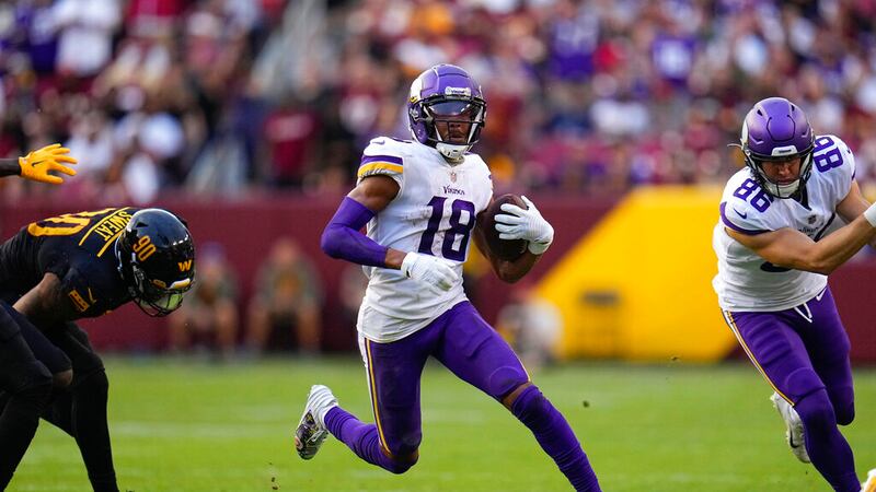 Minnesota Vikings wide receiver Justin Jefferson (18) running with the ball during the second...