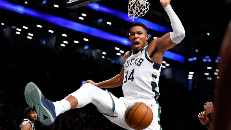 Milwaukee Bucks forward Giannis Antetokounmpo (34) reacts after a dunk against the Brooklyn...
