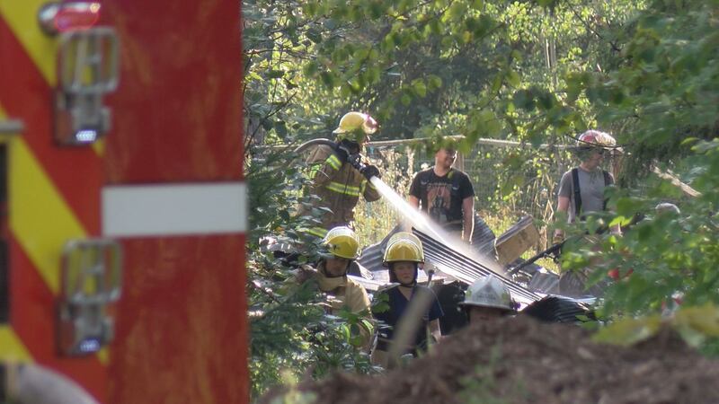 Authorities deemed the barn a "total loss" after the owner was burning brush near the...
