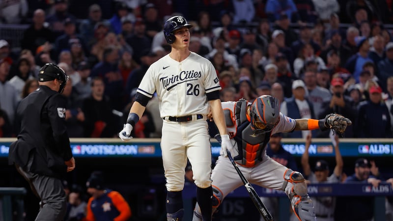 Minnesota Twins' Max Kepler reacts after striking out to end the ninth inning of Game 4 of a...