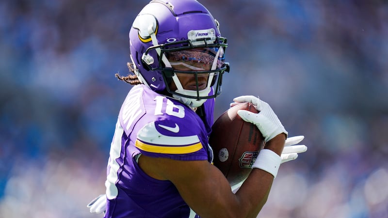 Minnesota Vikings wide receiver Justin Jefferson catches a touchdown pass against the Carolina...