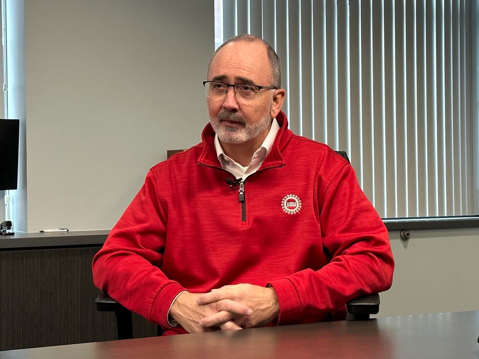 United Auto Workers President Shawn Fain speaks to a reporter from The Associated Press during...